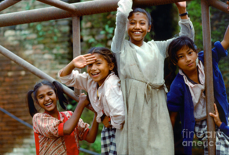Girls Smiling in Kathmandu, Nepal Photograph by Wernher Krutein