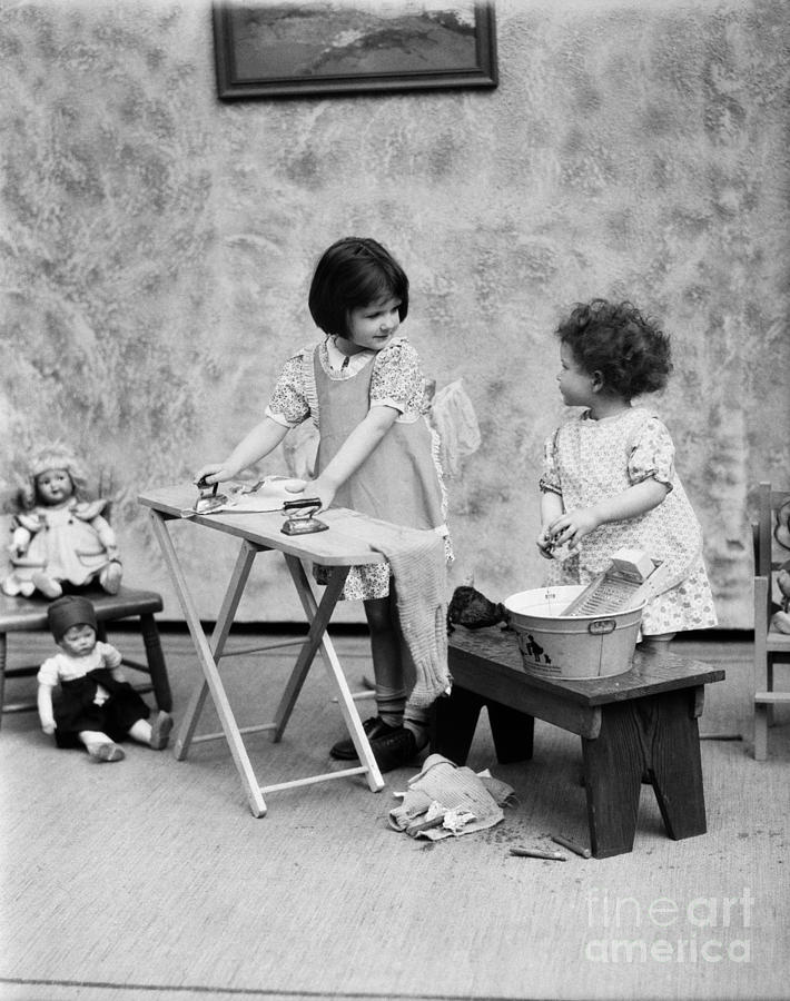 Girls Washing Doll Clothes, C.1920s Photograph by H. Armstrong Roberts/ClassicStock