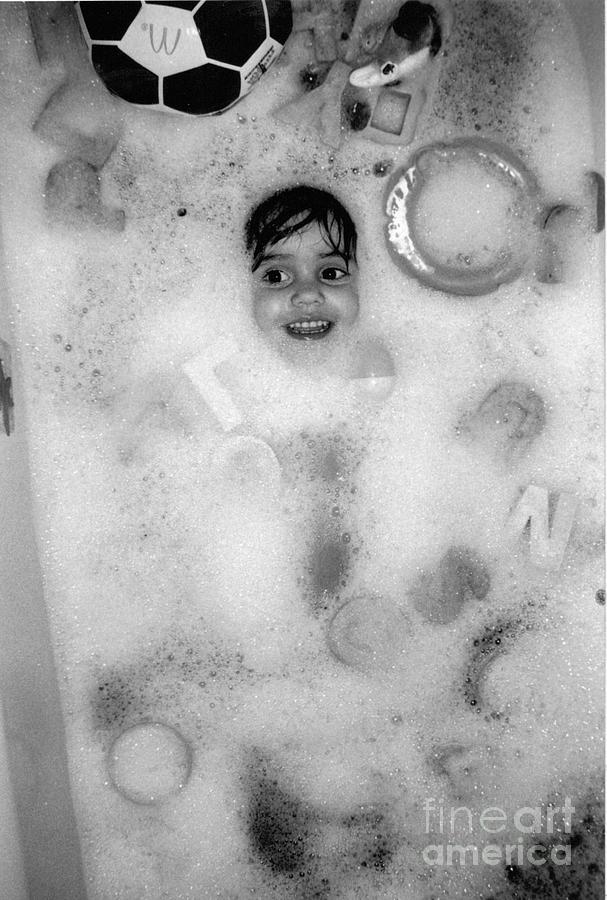 Girls who love bubble baths..grow up to be woman who love bubble baths Photograph by WaLdEmAr BoRrErO