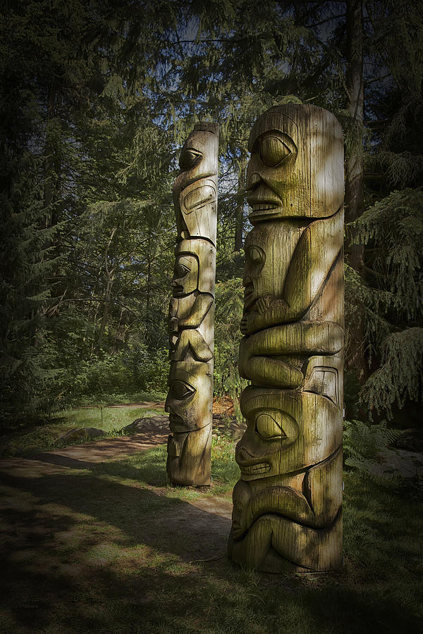 Gitksan Totem Poles Photograph by Theresa Tahara