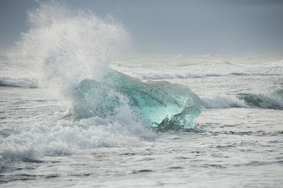 Glacial Iceberg in Beach Surf. Photograph by Andy Astbury