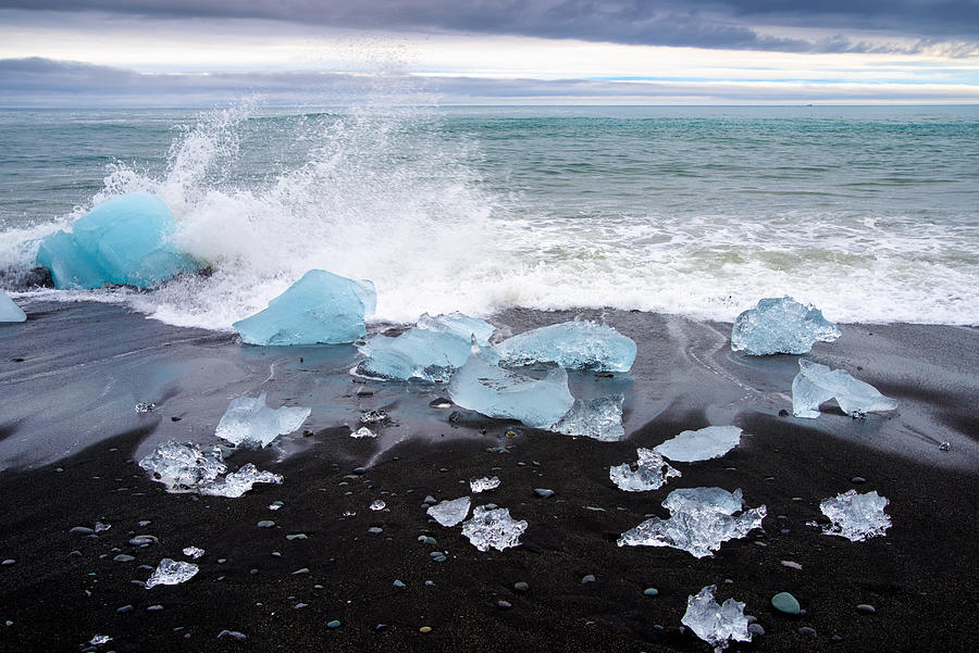 Nature Photograph - Glacier ice and black beach in Iceland by Matthias Hauser