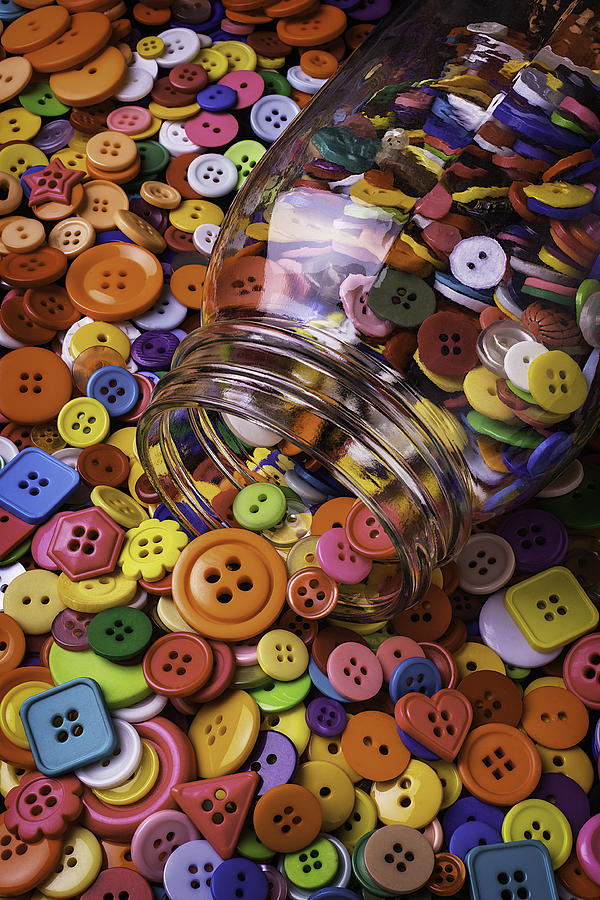 Glass Jar Spilling Buttons Photograph by Garry Gay