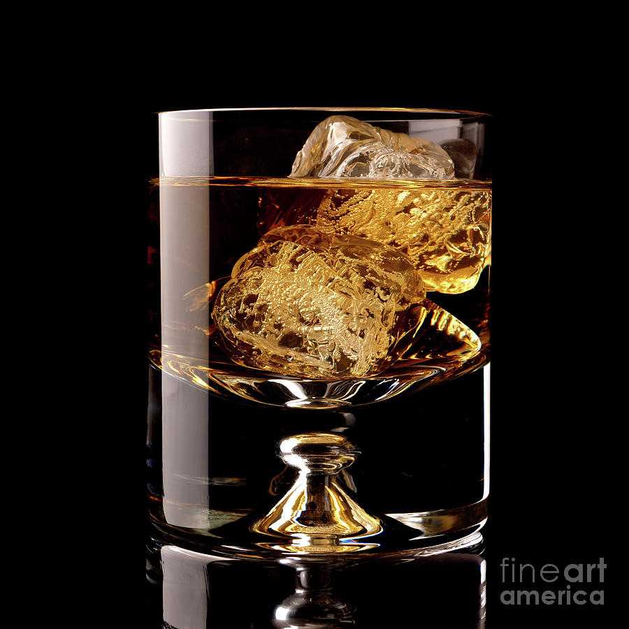 Glass of whiskey Photograph by Andreas Berheide