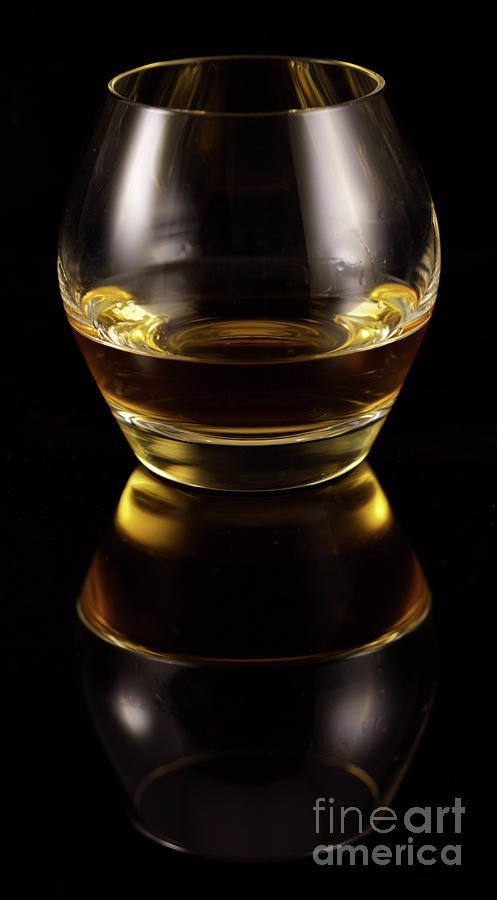 Glass of whiskey Photograph by Bruce Block