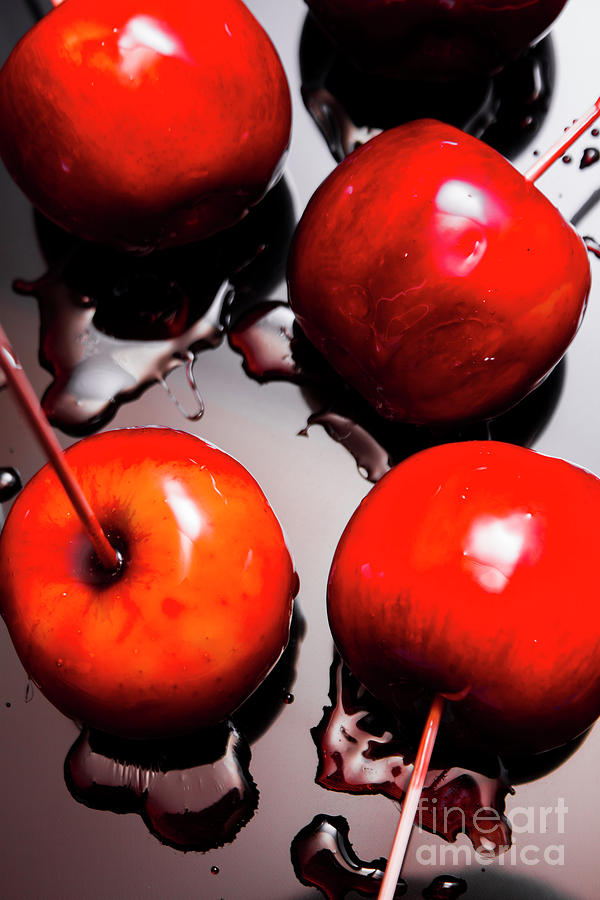 Candy Photograph - Gleaming red candy apples by Jorgo Photography