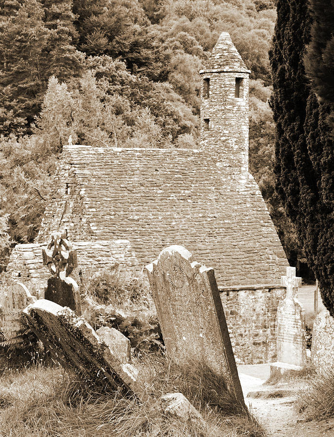 Glendalough Ireland St Kevins Church Behind Headstones Wicklow Mountains Sepia Photograph by Shawn OBrien