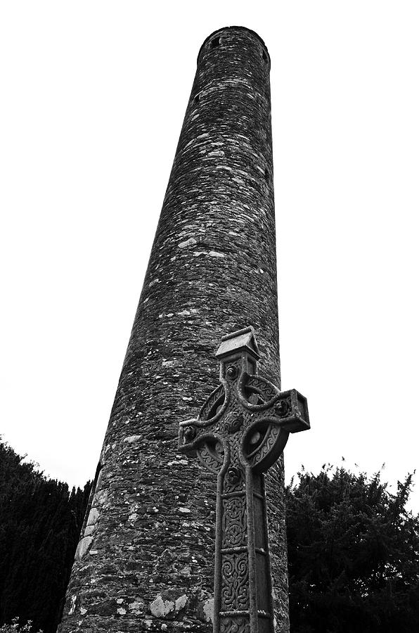 Glendalough Irish Round Tower Above Celtic High Cross County Wicklow Ireland Black and White Photograph by Shawn OBrien