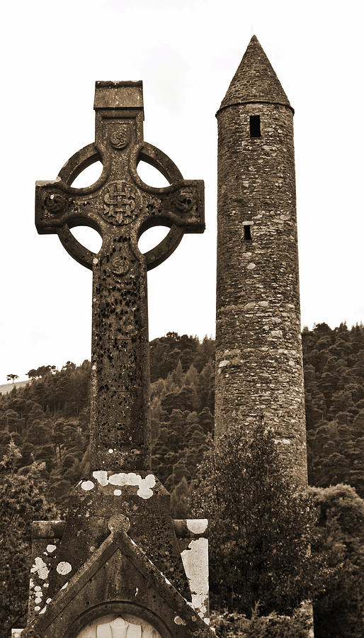 Glendalough Irish Round Tower Beside Celtic High Cross County Wicklow Ireland Sepia Photograph by Shawn OBrien