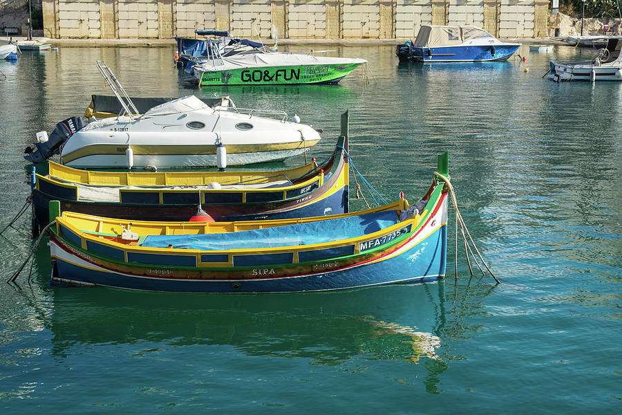 Glossy Mediterranean Colors - Traditional Maltese Luzzus and Modern Boats Juxtaposition Photograph by Georgia Mizuleva