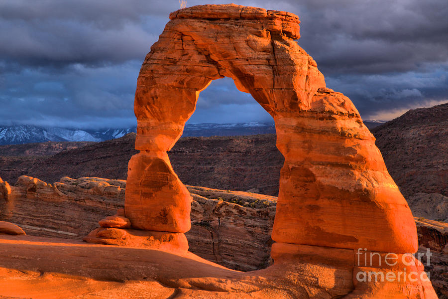 Arches National Park Photograph - Glowing Against The Storm Clouds by Adam Jewell