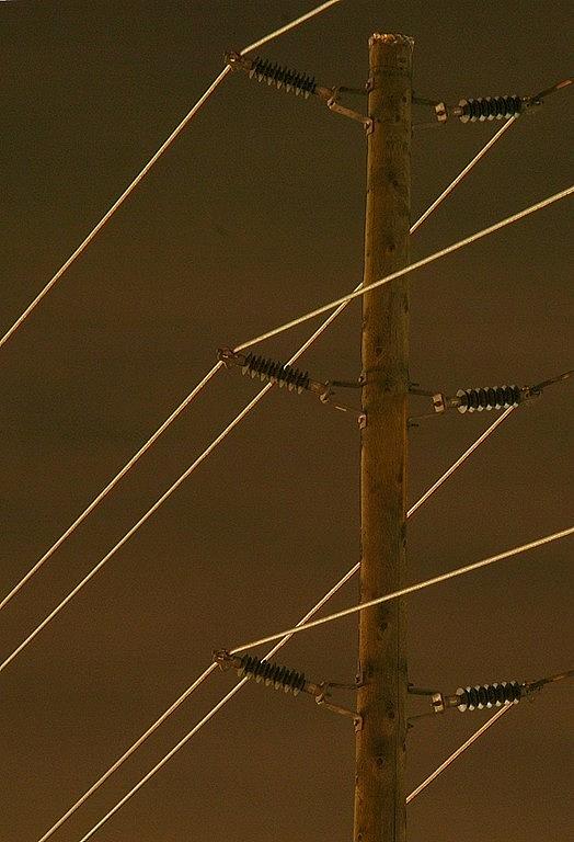 Glowing Power Lines Photograph by Bill Kellett