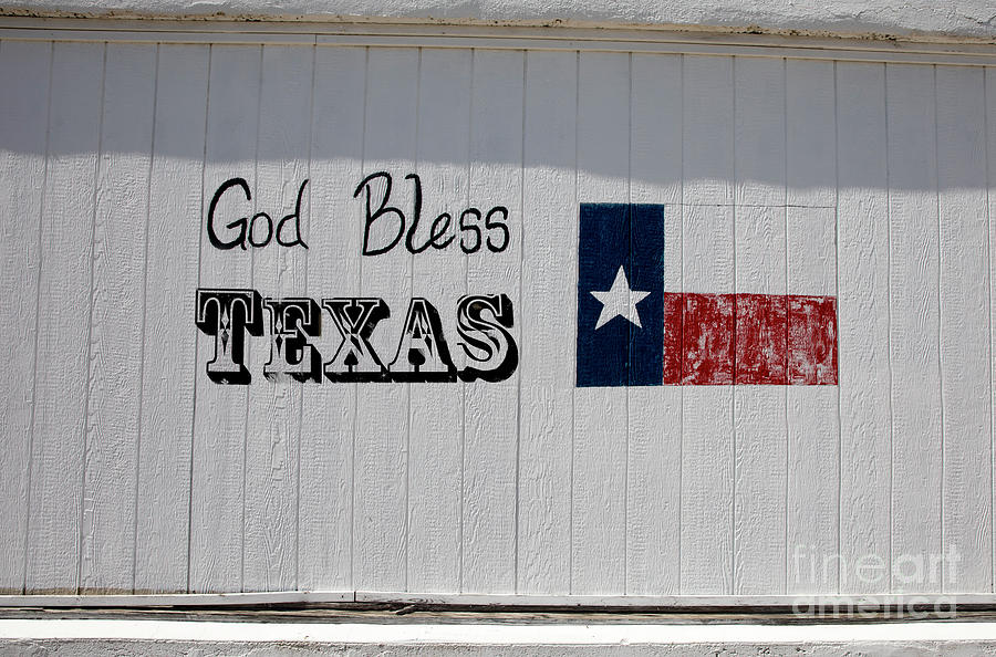 God Bless Texas Photograph - God Bless Texas with Texas Flag painted on the side of a building by Dan Herron