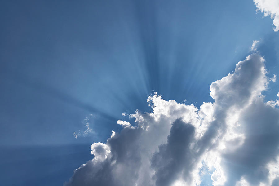 God Rays - Soft Clouds and Radiating Sunbeams Photograph by Georgia Mizuleva