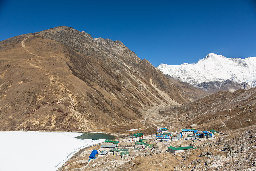 Gokyo village and the frozen lake Photograph by Didier Marti