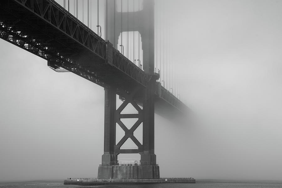 Golden Gate bridge fog - black and white Photograph by Stephen Holst