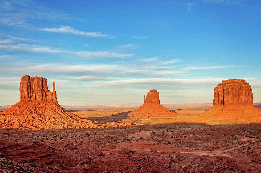 Golden hour in Monument Valley Photograph by Daniela Constantinescu