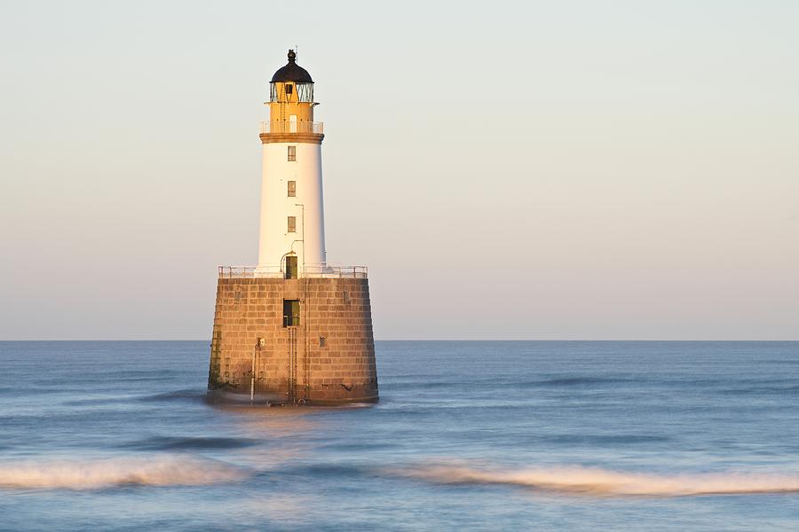 Golden Light and sea waves at Rattray Head Photograph by Stephen Taylor
