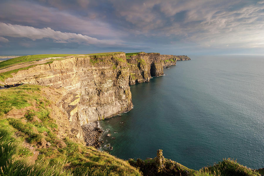 Golden light at the Cliffs Of Moher Photograph by Pierre Leclerc Photography