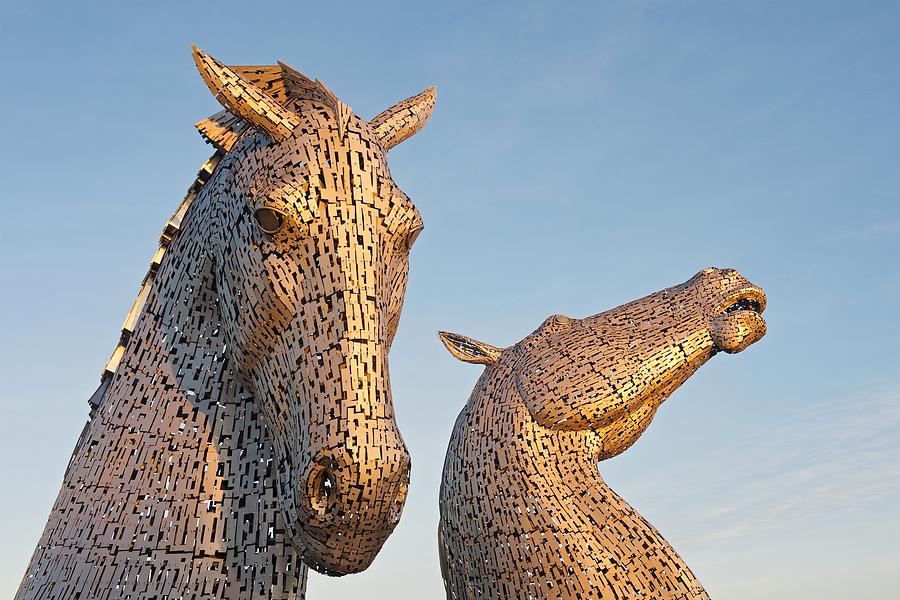 Golden Light Hits the Kelpies Photograph by Stephen Taylor