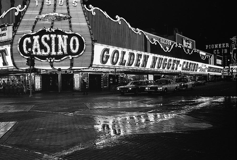 Golden Nugget Casino at night in the rain Las Vegas Nevada 1979 Photograph by David Lee Guss