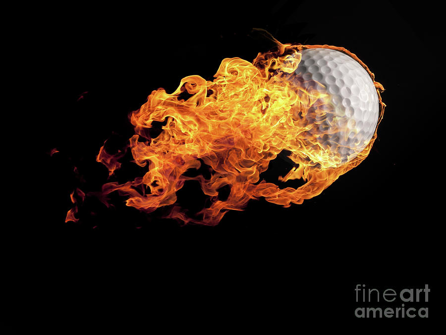 Golf ball with flames on black Photograph by Andreas Berheide