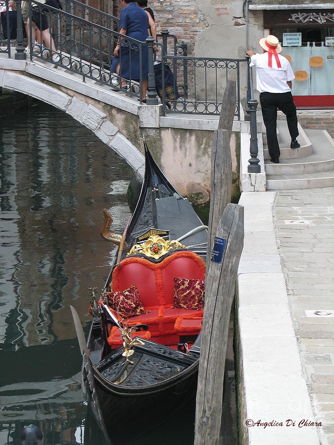 Gondola and Gondolier at rest in Venice Photograph by Italian Art