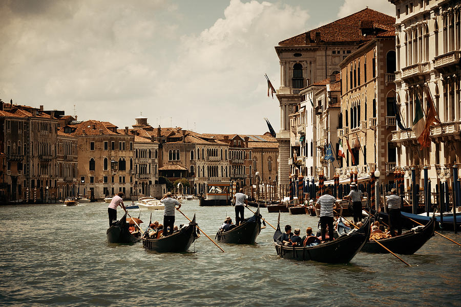 Gondola in canal in Venice Photograph by Songquan Deng