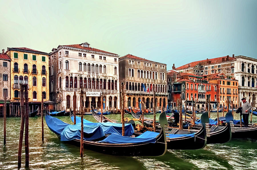 Gondolas and Gondoliers Photograph by Maria Coulson