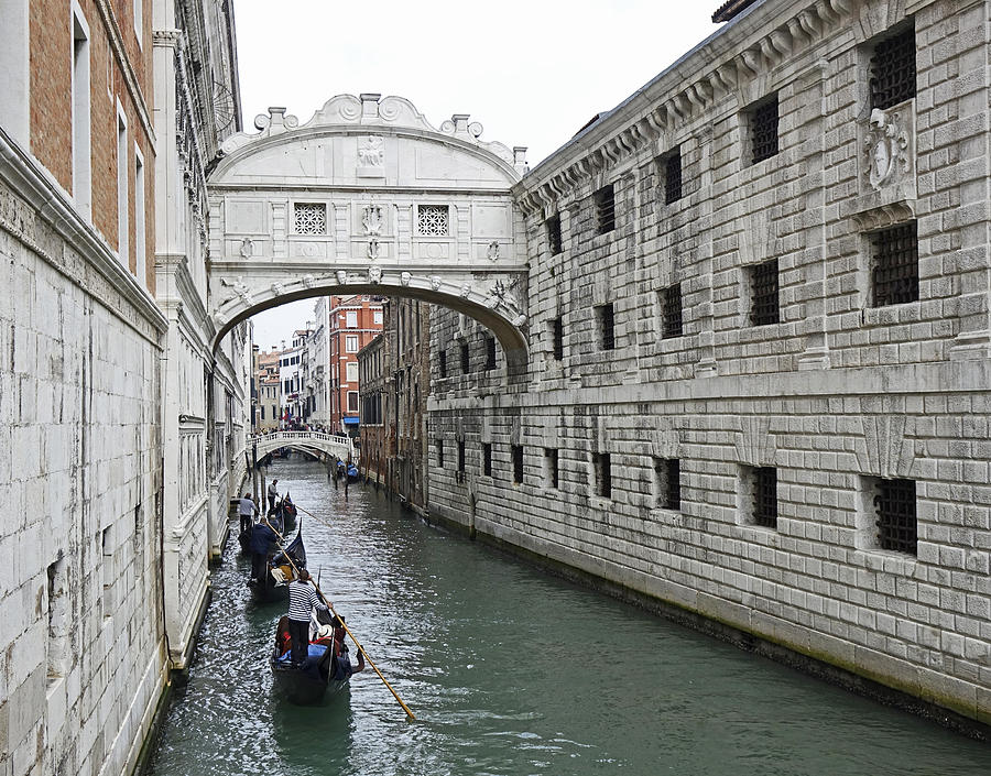 Gondolas Going Under The Bridge Of Sighs In Venice Italy Photograph by Rick Rosenshein