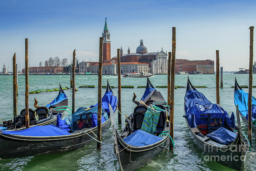 Gondolas in Venice with San Giorgio di Maggiore church Photograph by Patricia Hofmeester