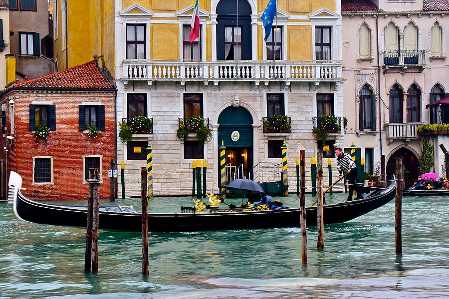 Gondolier at Work Photograph by Frozen in Time Fine Art Photography
