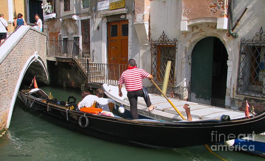 Gondolier by the bridge- Venice Photograph by Italian Art