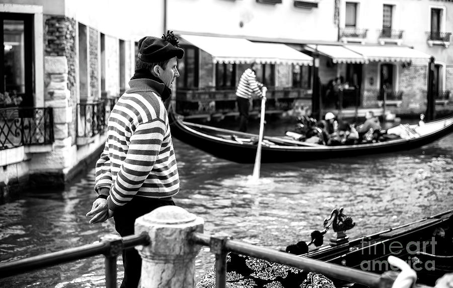 Gondolier on the Canal Venice Photograph by John Rizzuto