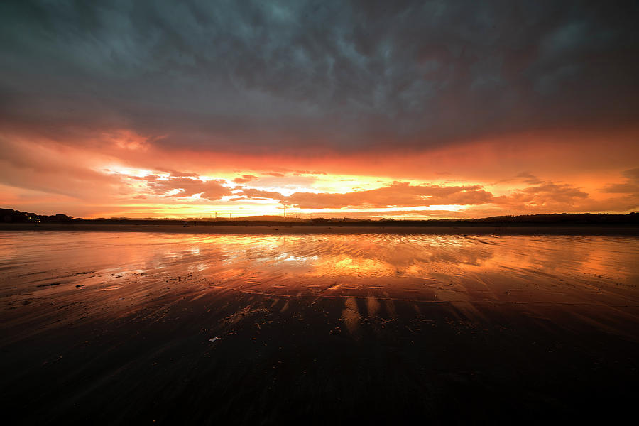 Good Harbor Beach Vibrant Sunset Reflection Photograph by Toby McGuire