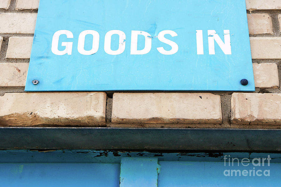 Brick Photograph - Goods in sign by Tom Gowanlock