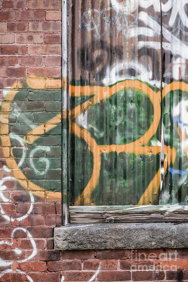 Graffiti covered wall of an old abandoned factory Photograph by Edward Fielding