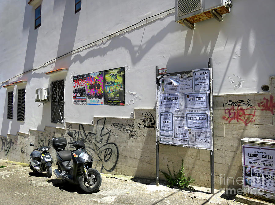 Graffiti and Bikes.Vieste.Italy Photograph by Jennie Breeze