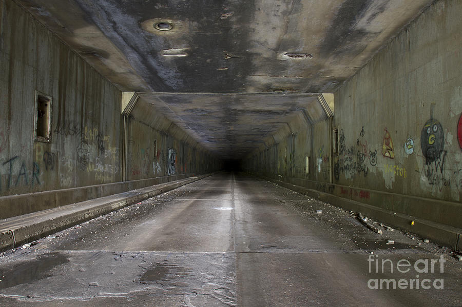 Grafitti in abandoned tunnel Photograph by Karen Foley