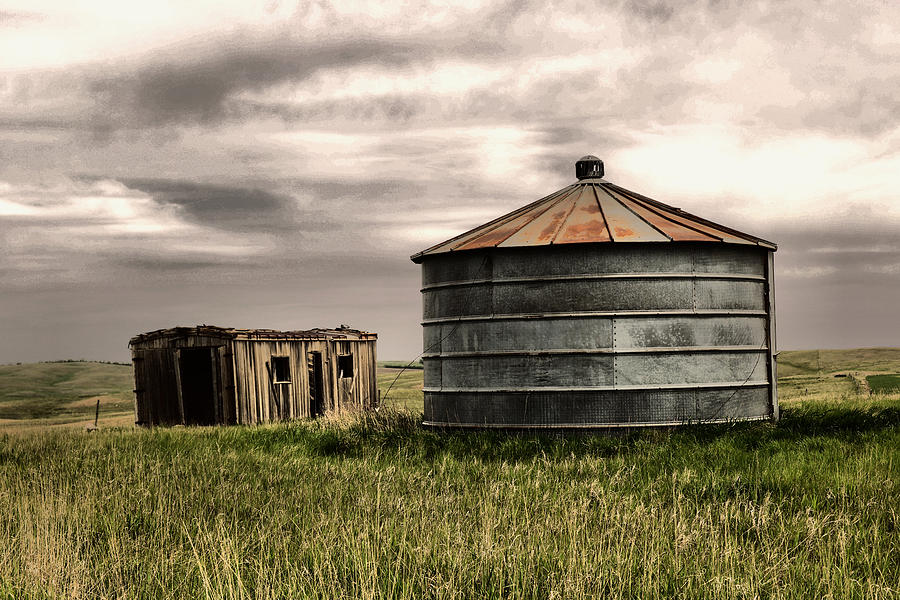 Grain silo and shed in a North Dakota Field Photograph by Jeff Swan