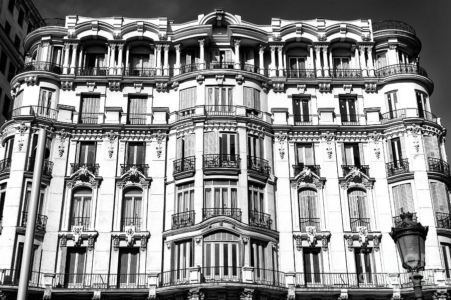 Gran Via Windows Madrid Photograph by John Rizzuto
