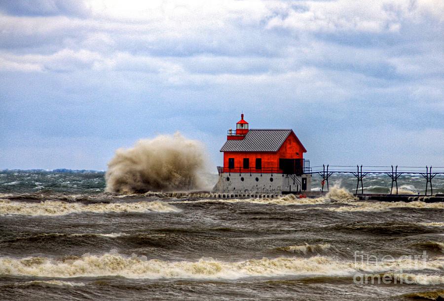 Grand Haven light house in the storm Photograph by Robert Pearson