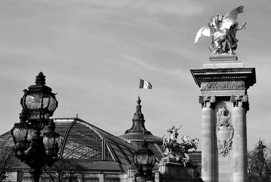 Grand Palais Flag and Statues from Pont Alexandre III Bridge Paris France Black and White Photograph by Shawn OBrien