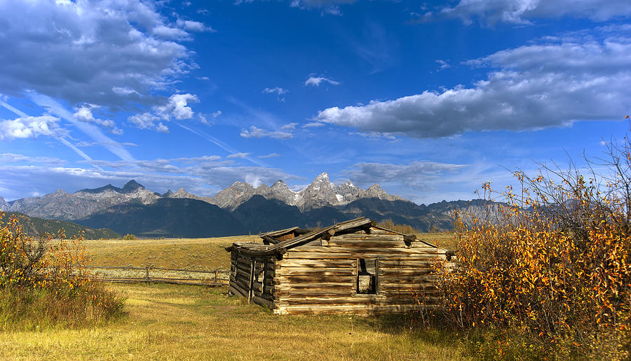 Grand Tetons and Shane Cabin Photograph by Gary Langley