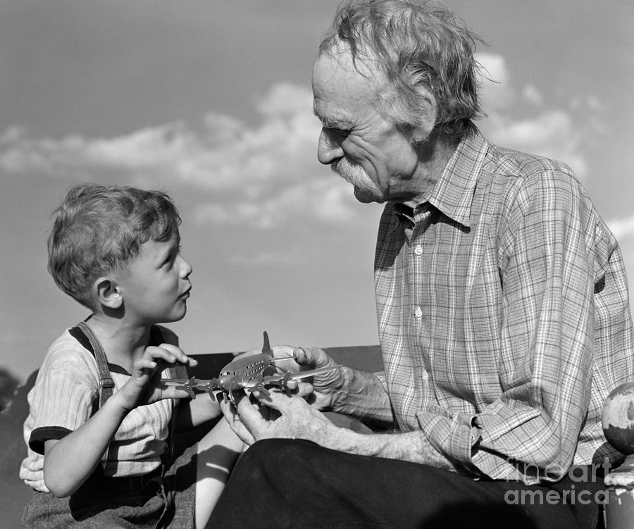 Toy Photograph - Grandfather And Boy With Model Plane by H. Armstrong Roberts/ClassicStock
