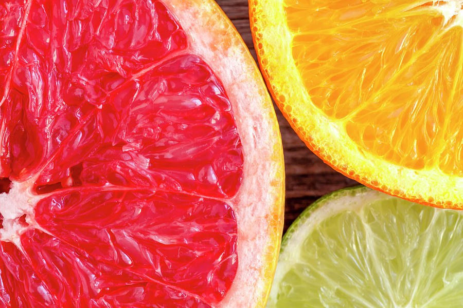 Grapefruit Orange Lime Photograph by Teri Virbickis