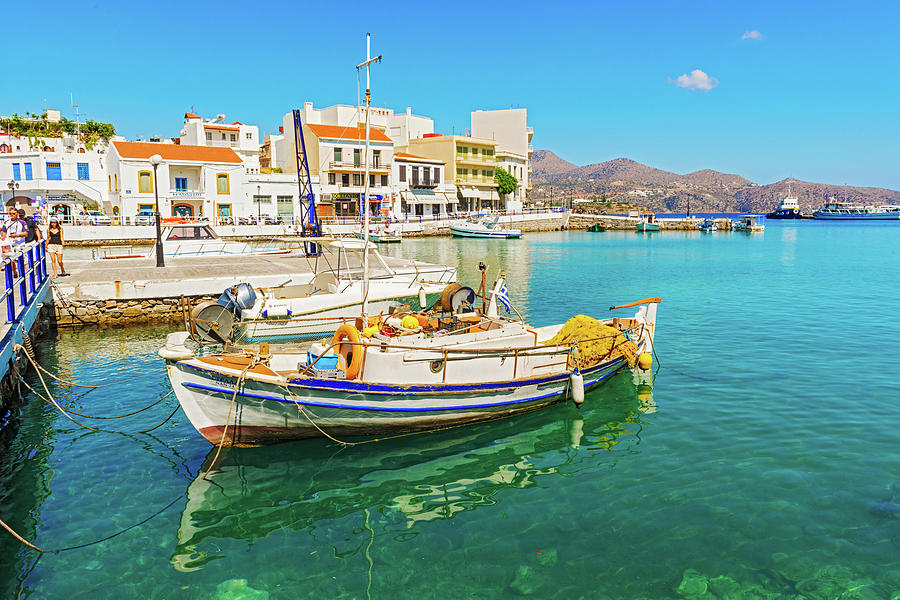Greek boat at Agios Nikolaos port Photograph by Marek Poplawski
