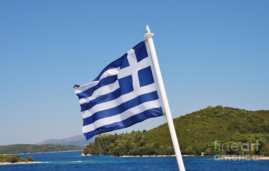 Greek flag in the Ionian Photograph by David Fowler