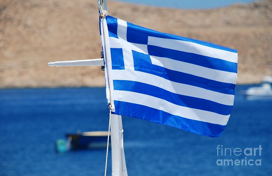 Greek National flag on Halki Photograph by David Fowler