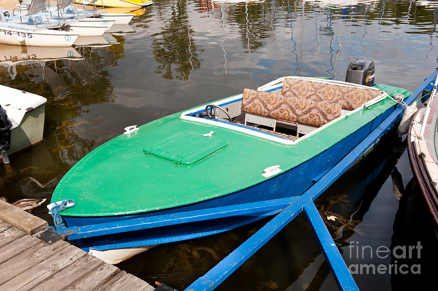 Green Motorboat Moored Photograph